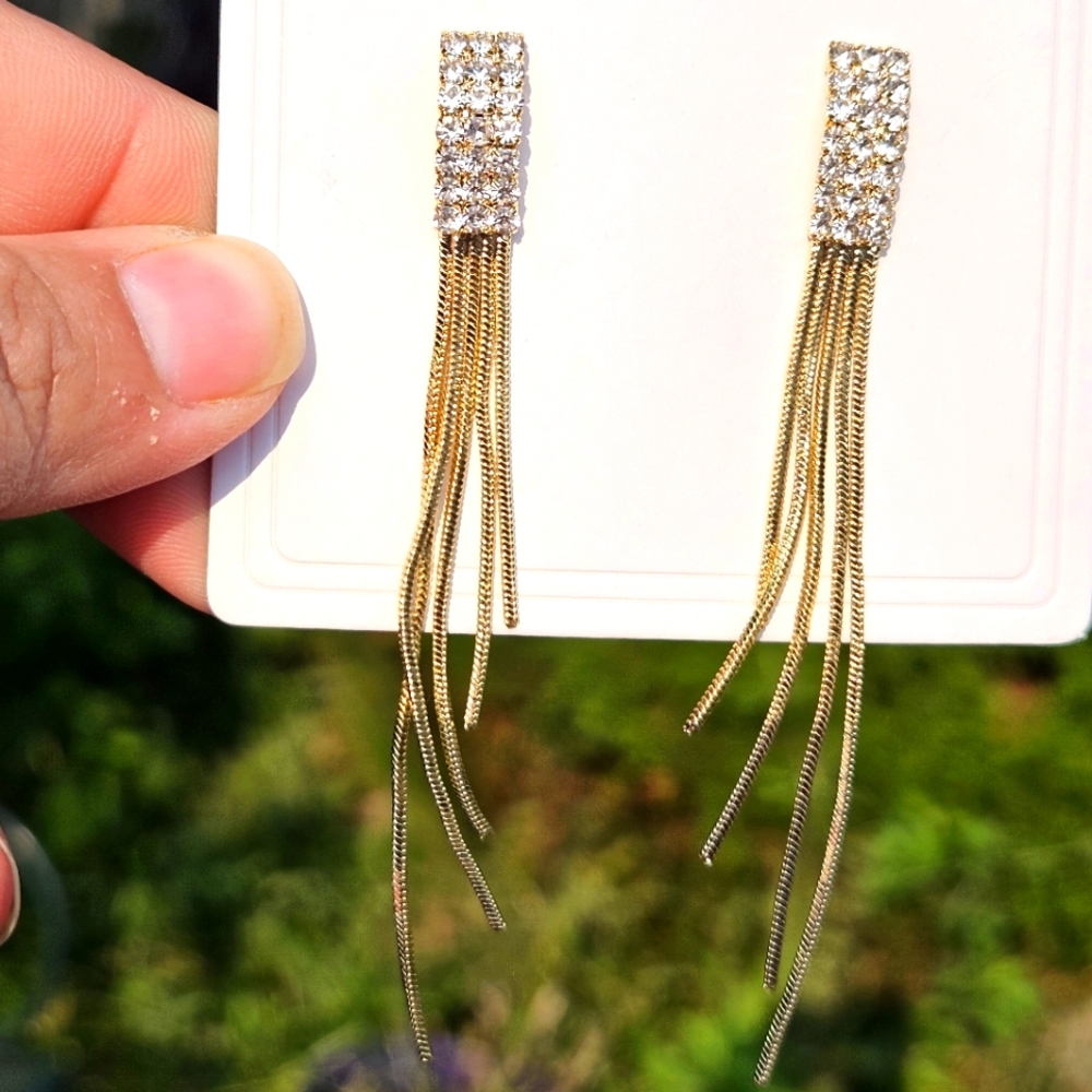 Gorgeous Gold Colored Tassel Earrings with White Gemstone Post